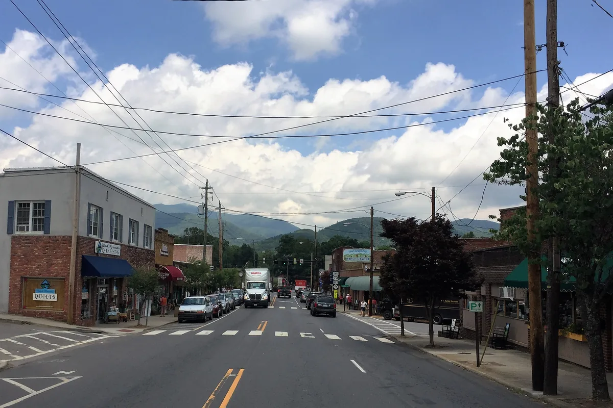 Downtown Black Mountain in Buncombe County, North Carolina, with the Blue Ridge rising beyond the end of the street